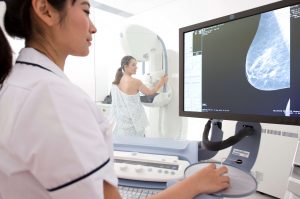 Radiologist reviewing results of patients mammogram