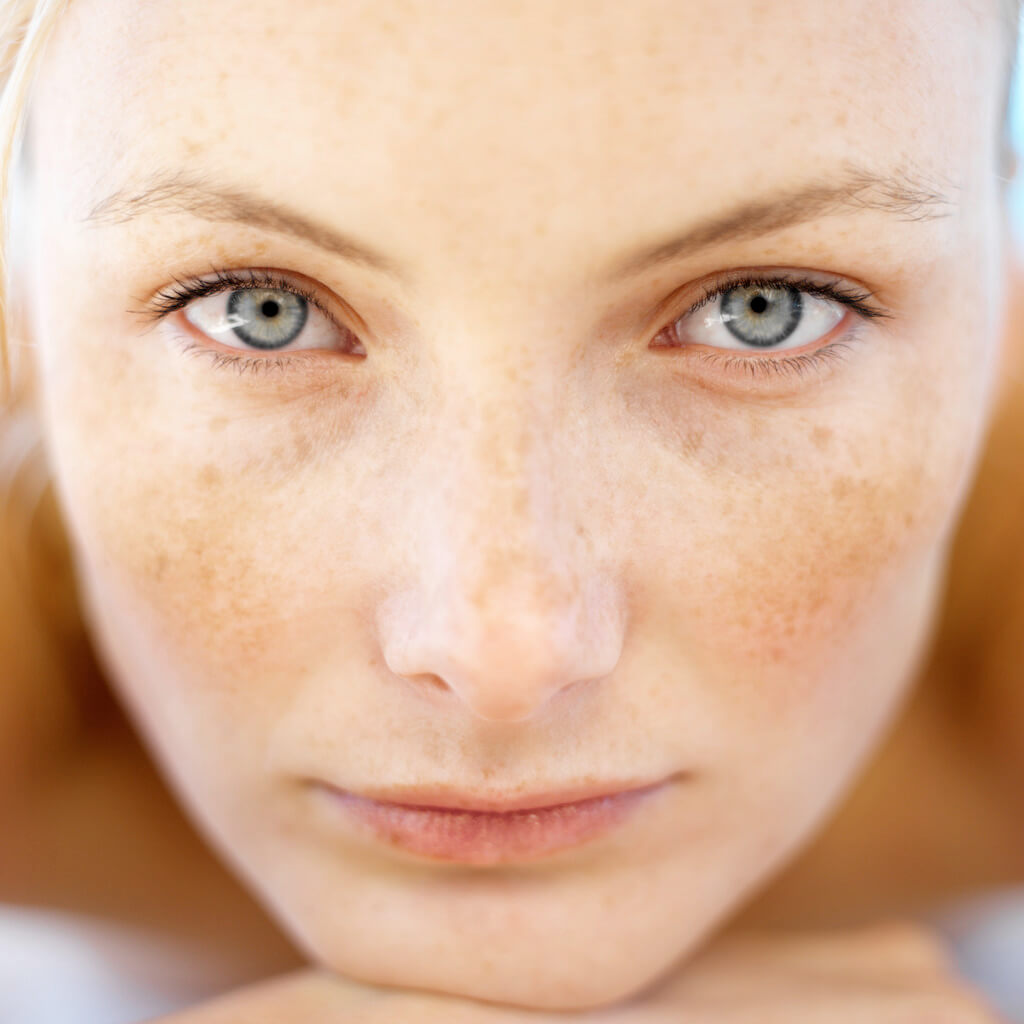 Young Woman Lying on Massage Table --- Image by © Royalty-Free/Corbis